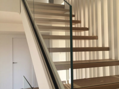 Glass railing for staircase